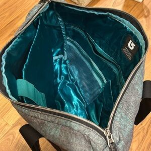 Burton shoulder bag, multiple inner and outer zippers
